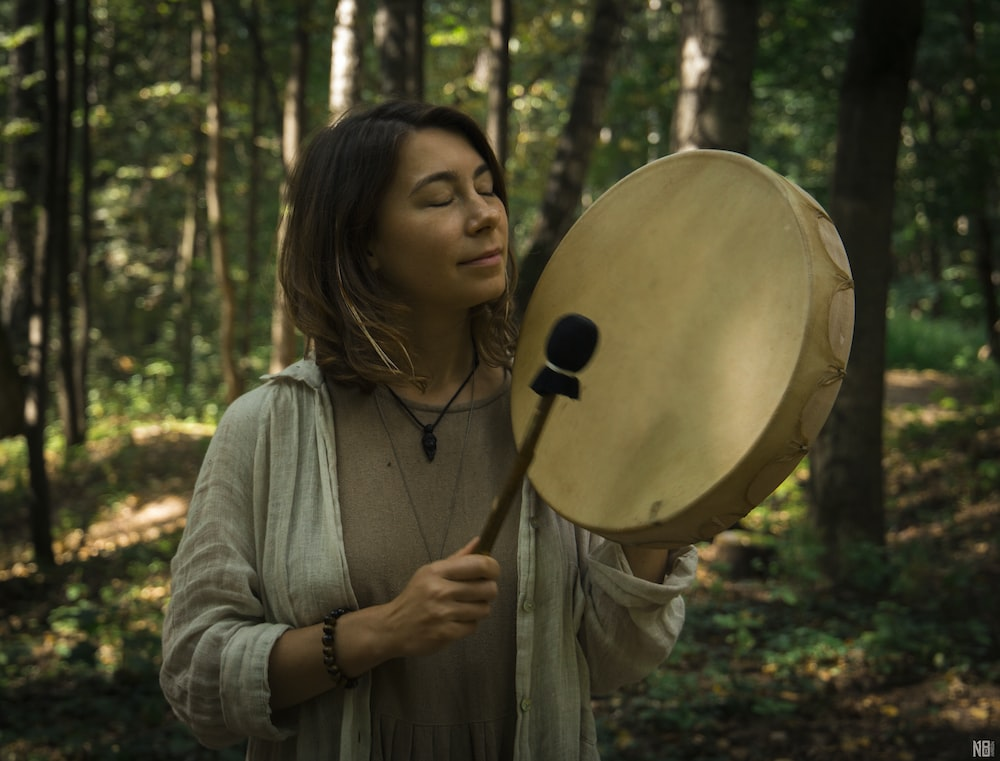 Shamanic-Ritual Person with a hand-drum performing Shamanic ritual